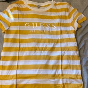 Guess yellow and white women’s shirt. Size XS.